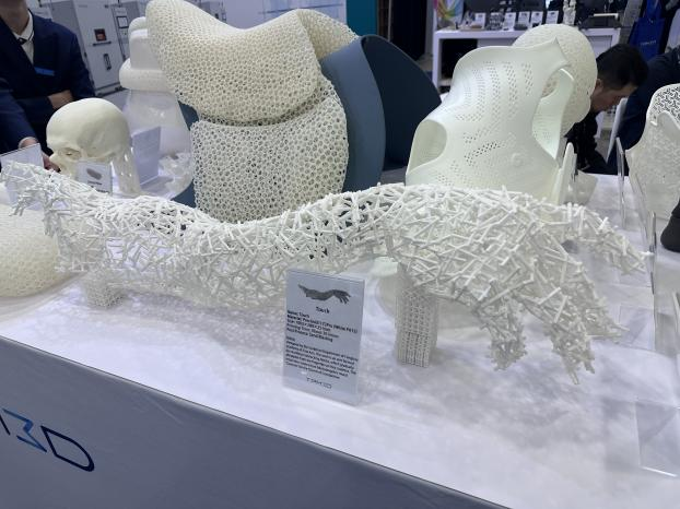 SLS 3D printed white parts with polymer powders presented at RAPID+TCT 2025