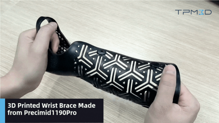3D printed black wrist orthosis that is bendable
