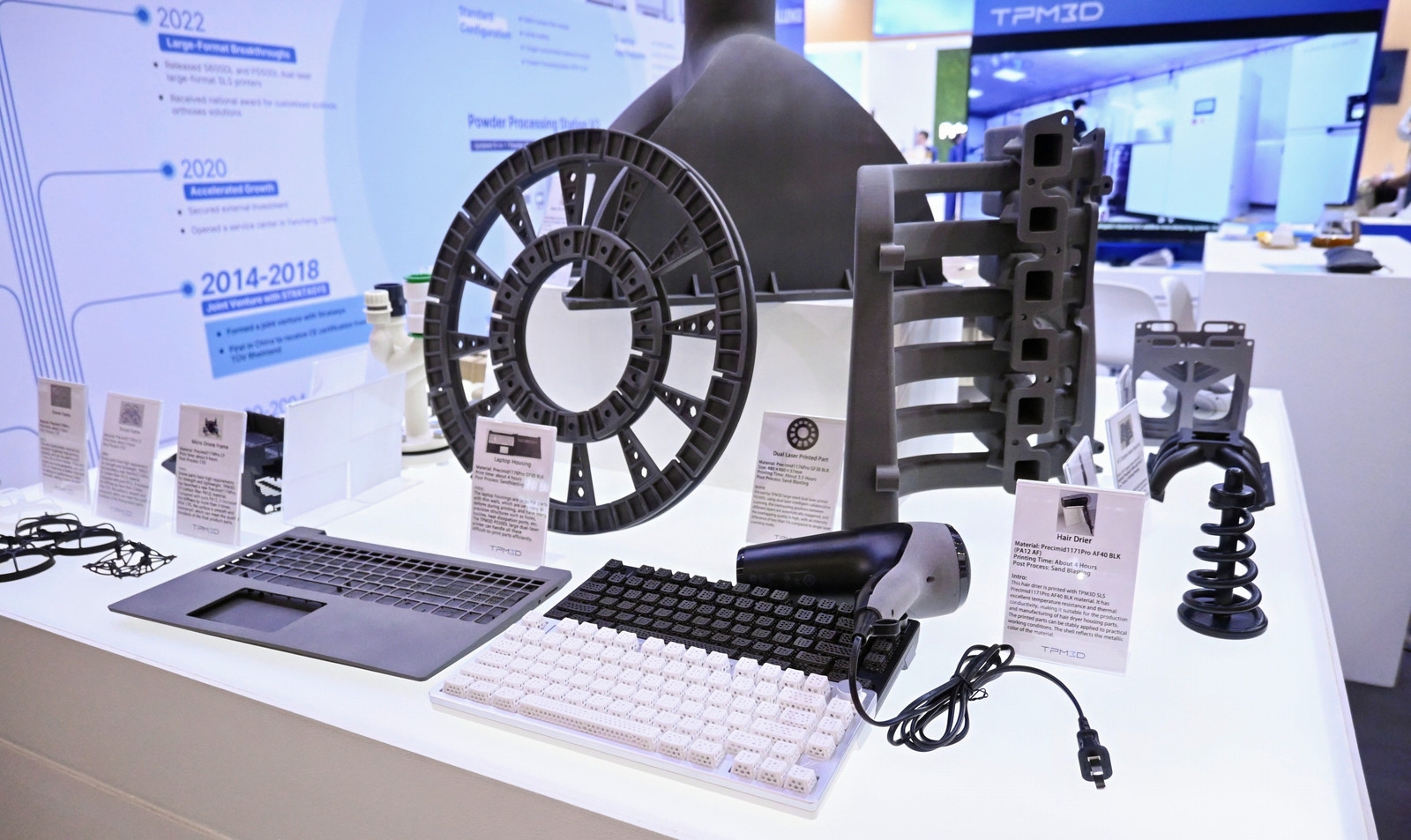 TPM3D’s new Precimid 1190 nylon and Precimid 1174Pro CF carbon-fiber nylon materials displayed