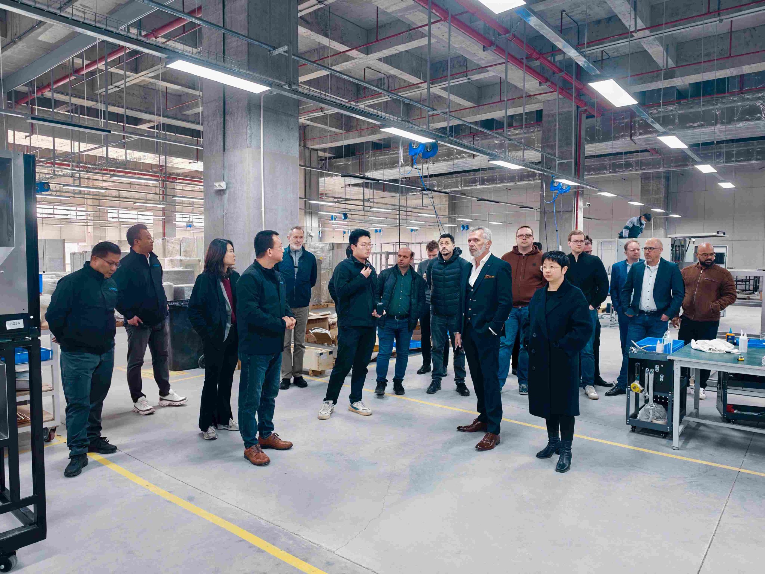 International partners visiting TPM3D Hefei manufacturing facility near Chaohu Lake