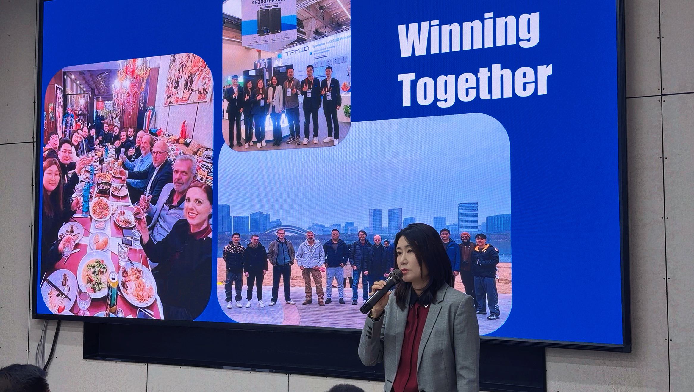 TPM3D CEO Lucy Zhai delivering keynote on SLS 3D printing market growth at 2026 Global Partner Conference